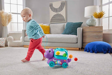 Fisher-Price Ball Fun Pull Along Dinosaur - UK English Version HNR50