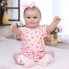 Tookyhill Reborn Baby Dolls- 18 Inch Full Vinyl Realistic Baby Doll Poseable Smiling Real Life Baby Girl with Blue Eyes, Pink Cherry Outfit & Headband