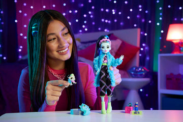 Monster High Creepover Party Doll, Frankie Stein with Pet Dog Watzie, Sleepover Clothes & Accessories like Pillow & Furry Robe