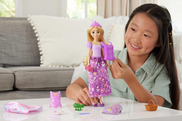 Mattel Disney Princess Toys, Rapunzel Fashion Doll with 2 Looks, 9 Accessories, 2 Snap-On Bodices & 2 Skirts, 2-in-1 Stories Inspired by Disney