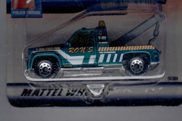 Matchbox 1999-88 of 100 Series 18 Police Patrol GMC TOW Truck 1:64 Scale