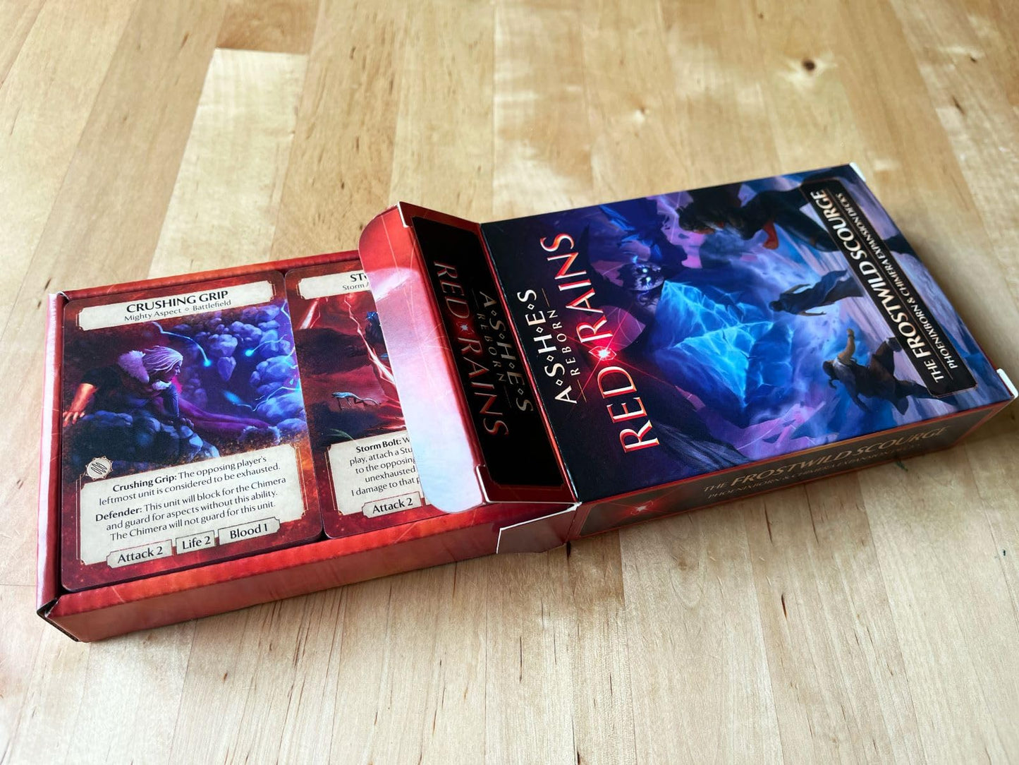 Plaid Hat Games Ashes Reborn: Red Rains Frostwild Scourge Expansion Decks - Phoenixborn & Chimera Set for 1-2 Players, Ages 14+ - Requires Corpse