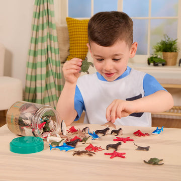 Terra by Battat - 60 Pieces Sea Animals In Tube - Realistic Mini Sea Animal Toys - Sharks, Dolphins, Penguins, Turtles, Crabs & Starfish for Toddlers