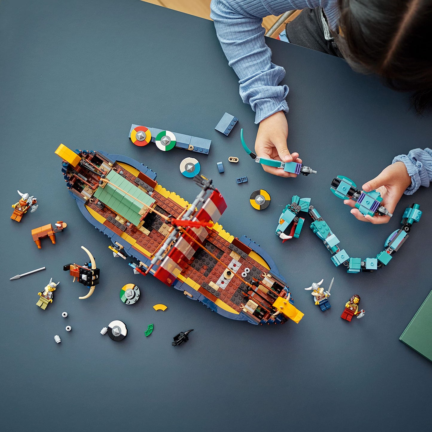 LEGO Creator 3 in 1 Viking Ship and The Midgard Serpent, Transforms from Amazing Ship to Viking House or Fenris Wolf Figure, Gifts for Kids, Boys, and