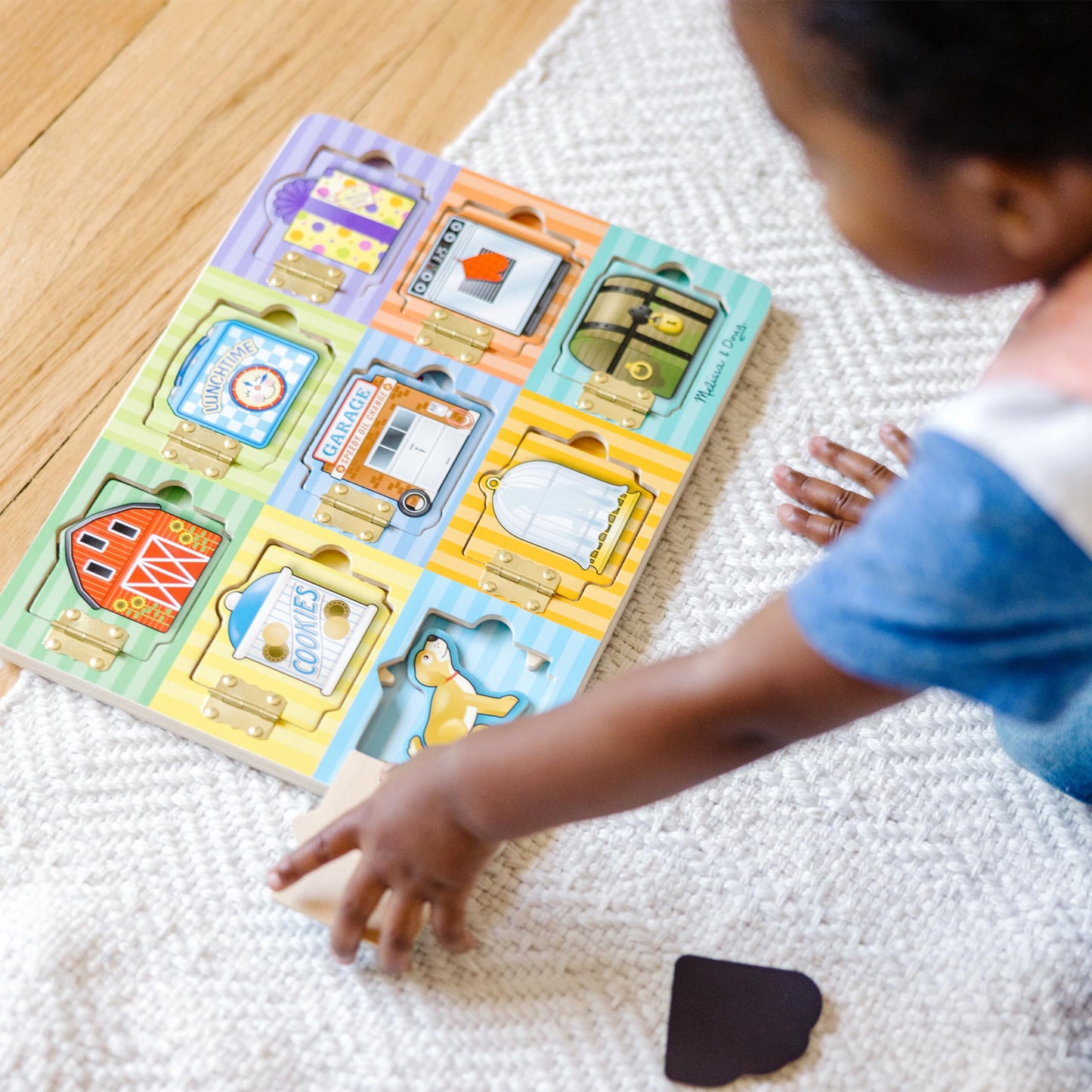 Melissa & Doug Wooden Hide & Seek Activity Board - Montessori Busy Board with Hinges, Doors & 9 Wooden Magnetic Puzzles, Educational Preschool