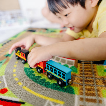 Melissa & Doug Round the Rails Train Rug with 3 Linking Wooden Train Cars (39 x 36 inches)