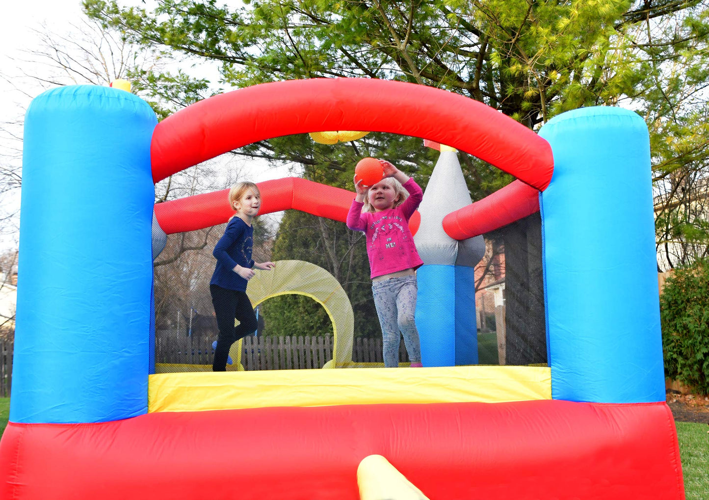 Bounceland Bounce House Castle with Basketball Hoop Inflatable Bouncer, Fun Slide, Safe Entrance Opening, UL Certified Strong Blower Included, 12 ft x
