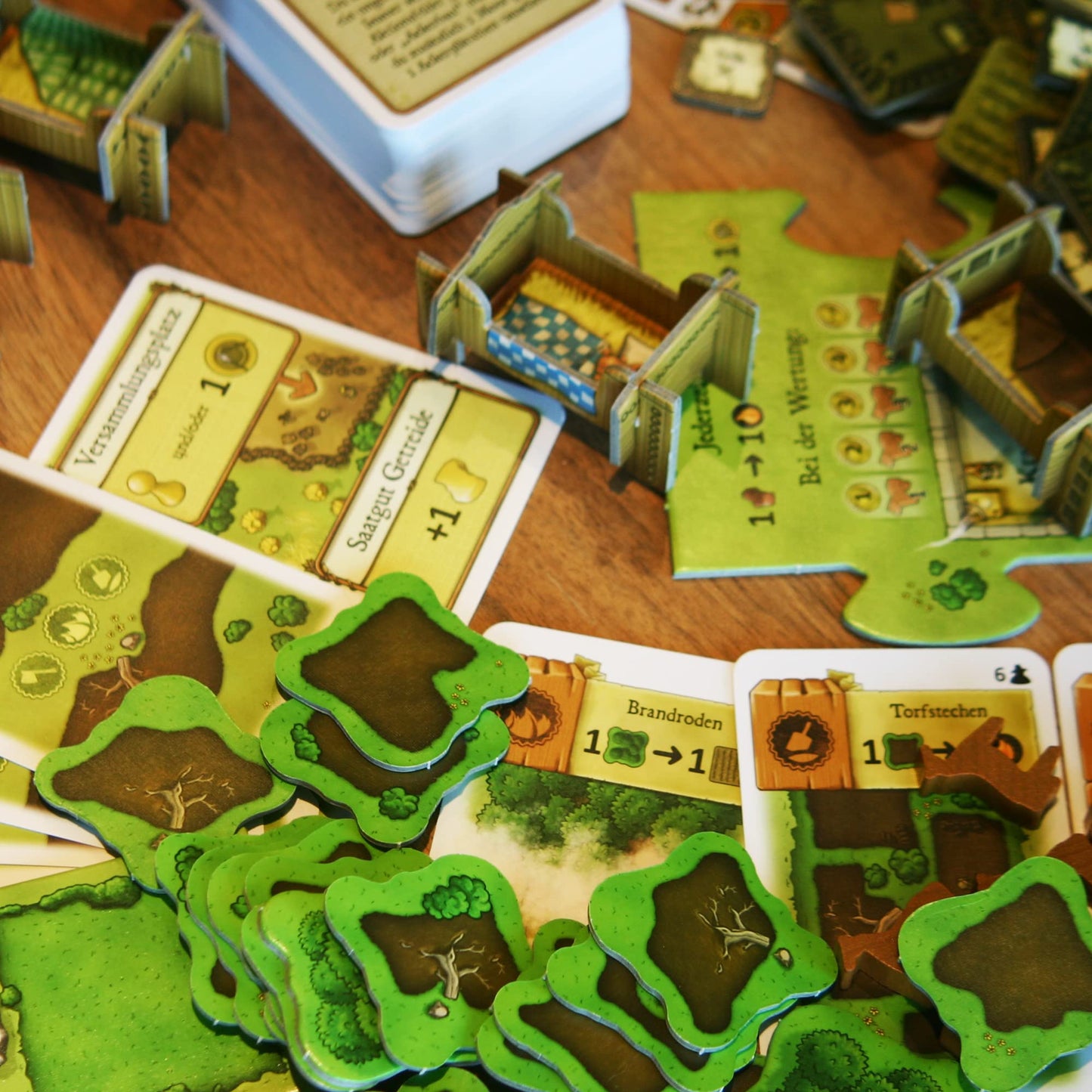 Agricola (Revised Edition) Farmers of The Moor Expansion | Strategy Game for Adults and Teens | Advanced Board Game | Ages 12+ | 1-4 Players | Avg