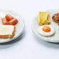 Miniature Food Plates Set of 2 - Hand-Sculpted Clay Bread, Sausage, Egg & Pork Steak on Ceramic Dishes - 1:6 Scale Dollhouse Accessories