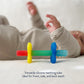 Itzy Ritzy Teensy Tube Teether - Textured Hollow Baby Teething Tube that Reaches Front Teeth & Back Molars, Made of Soft Silicone (Rainbow)