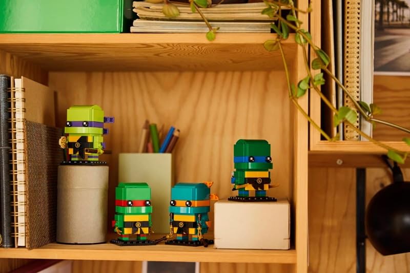 LEGO BrickHeadz Teenage Mutant Ninja Turtles Set - 567 Pieces, All 4 TMNT Figures with Iconic Weapons & Pizza Accessory - Ages 10+ - Gift for Kids &