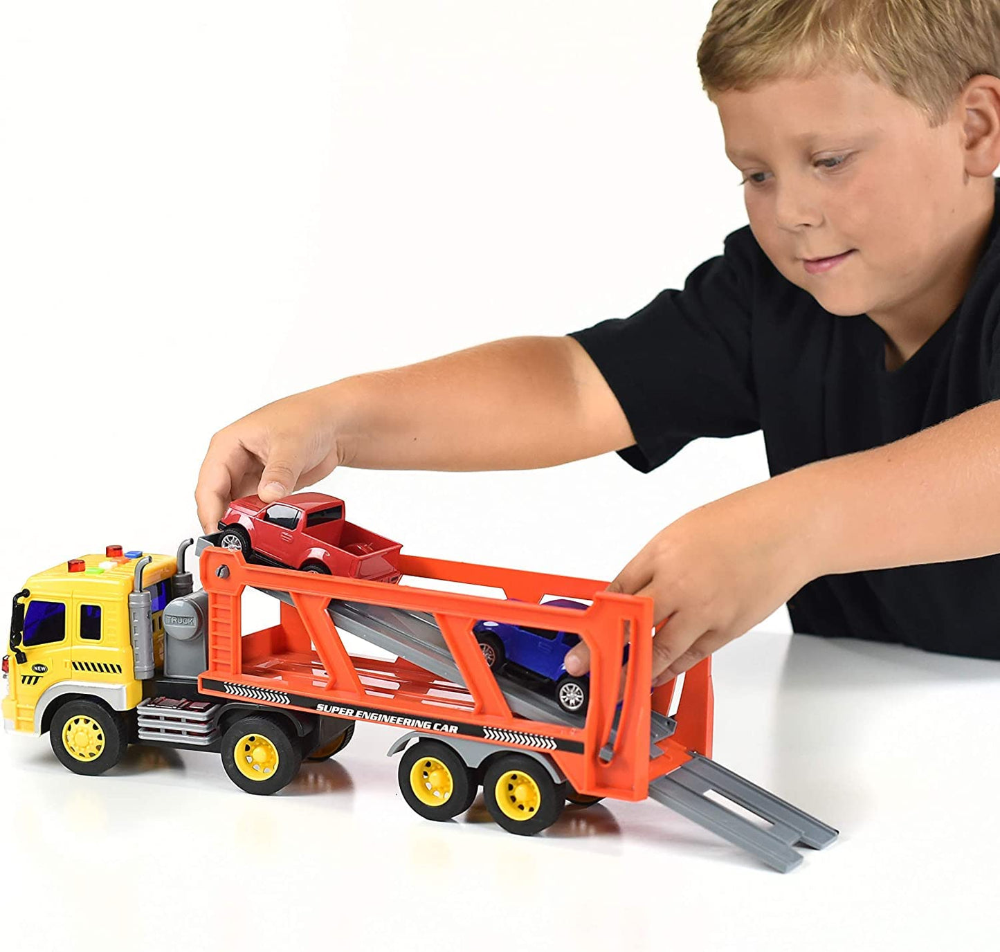 Sunny Days Entertainment Maxx Action 17’’ Vehicle Transport with 4 Diecast Trucks - Bright Lights and Car Sounds | Friction Powered Trailer | 6 Piece