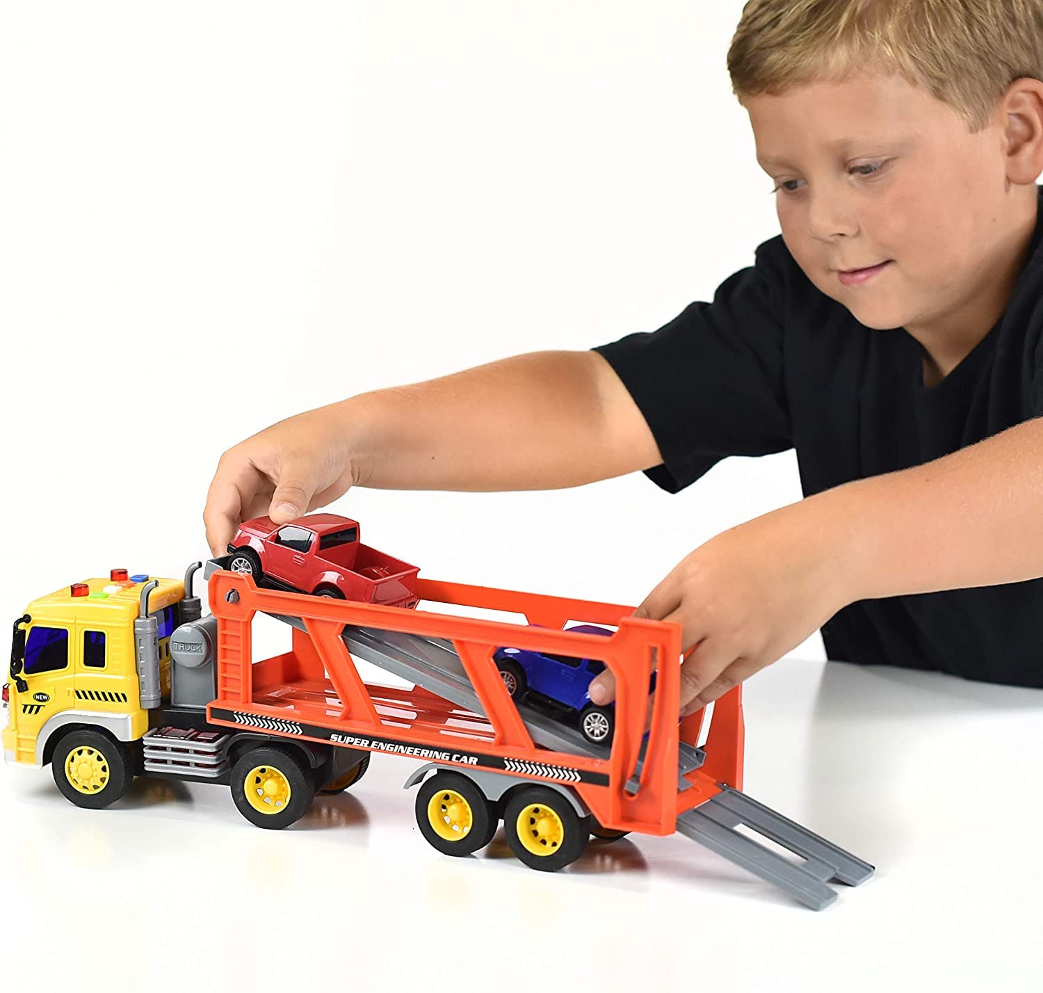 Sunny Days Entertainment Maxx Action 17’’ Vehicle Transport with 4 Diecast Trucks - Bright Lights and Car Sounds | Friction Powered Trailer | 6 Piece