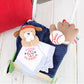 Baby Starters Plush 13 inch Puppy Snuggle Buddy with Toy Rattle, Little Slugger Baseball Embroidery and Satin, White with Stripe Trim