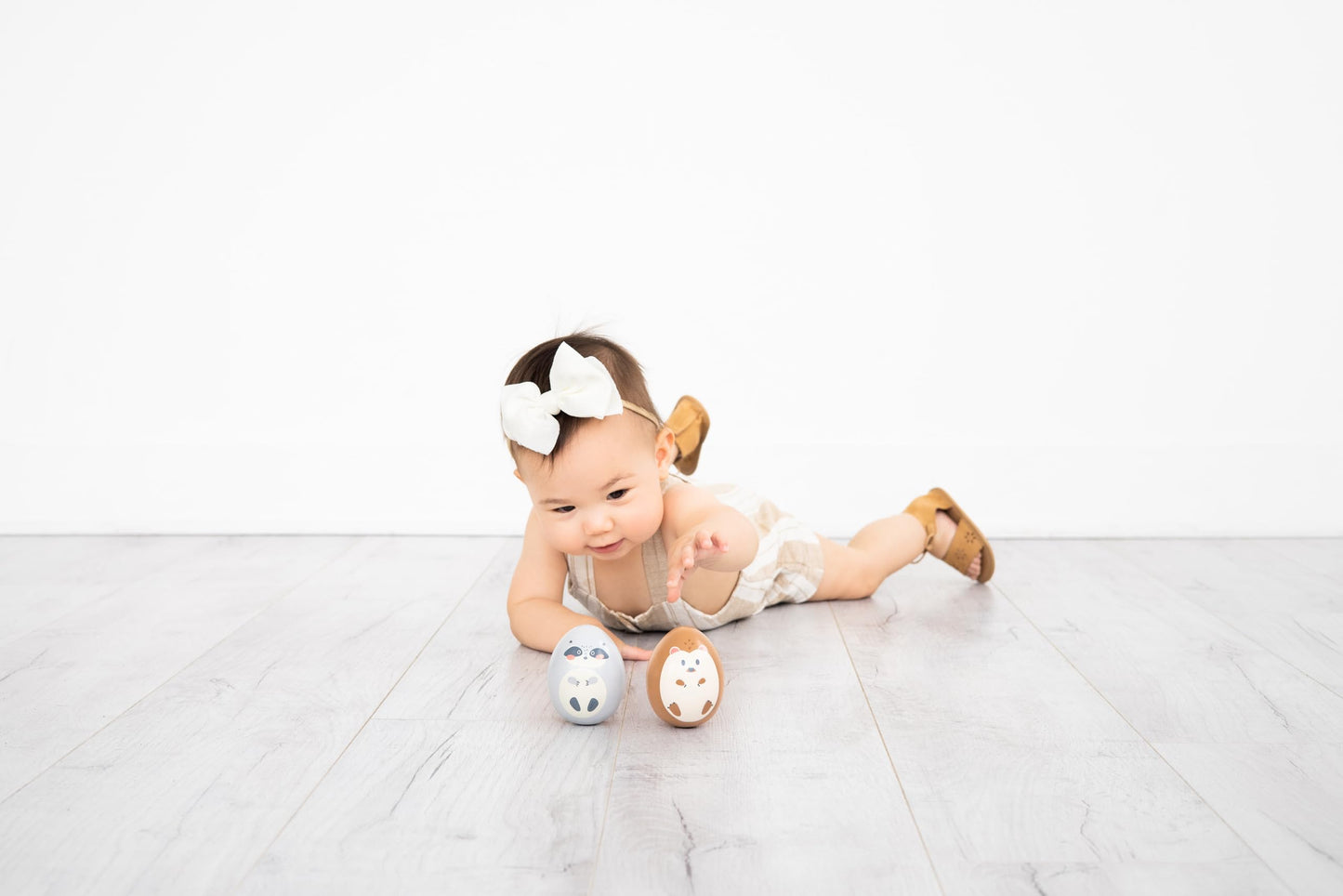 Pearhead Baby Wooden Wobble Toy Set, Raccoon and Hedgehog Balance Toys