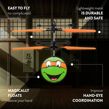 World Tech Toys Ninja Turtles Michelangelo Flying Toy - Motion Sensing Flying Ball with USB Charging - TMNT Licensed - Indoor/Outdoor Drone for Kids