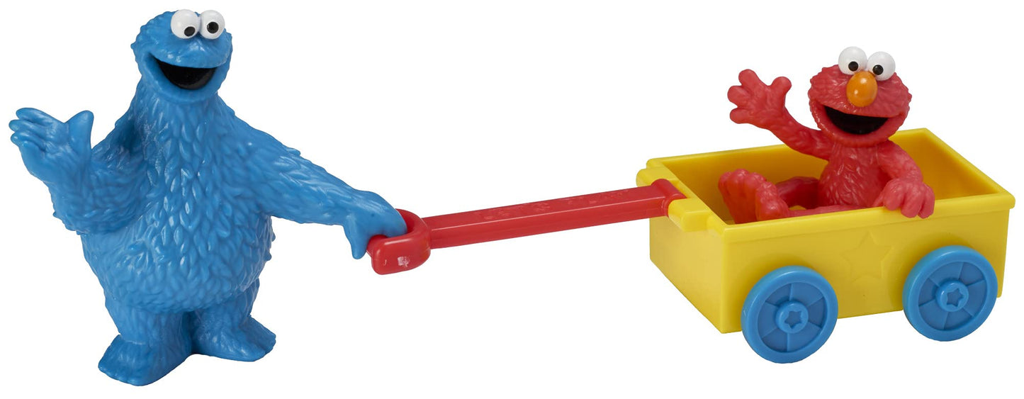 DecoSet® Sesame Street® Let's Play Cake Topper, 2-Piece Birthday Cake Decoration with Cookie Monster and Elmo in a Free-Wheeling Wagon, Ready to Use