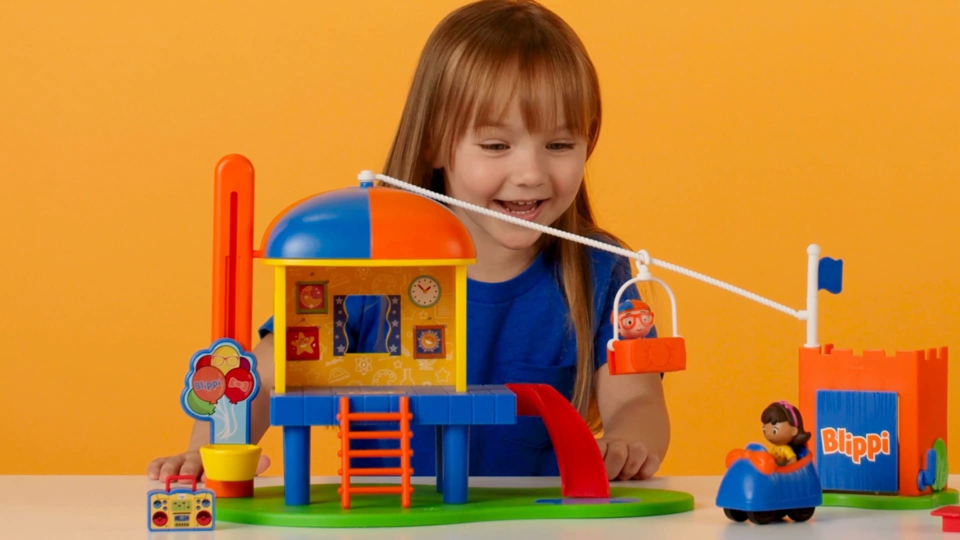 Blippi’s Ultimate Party Adventure, Deluxe Playset - Includes Exclusive Party Blippi Figure, Girl Figure, Playground Playset, 4 Accessories, Sounds