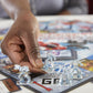 Monopoly: Transformers Edition Board Game for 2-6 Players Kids Ages 8 and Up, Includes Autobot and Decepticon Tokens