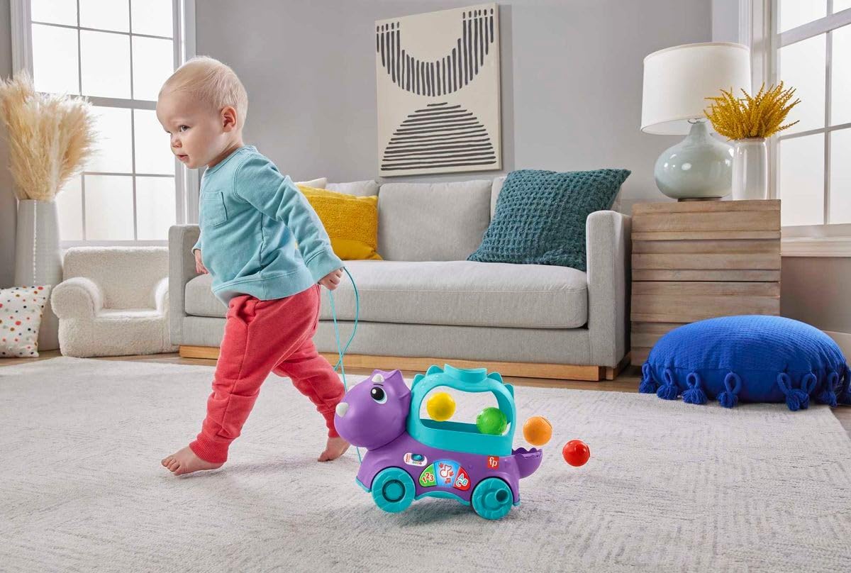 Fisher-Price Ball Fun Pull Along Dinosaur - UK English Version HNR50