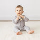 Itzy Ritzy - Ritzy Teether for Molars - Massages Sore Gums & Reaches Back Molars - Silicone Baby Teething Toy with Multiple Textures & Flexible Design
