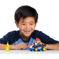 Super Mario Spin Out Mariokart Mario Racer Vehicle with 360 Spins, Wind Up and Go! Includes One 2.5” Mario Action Figure