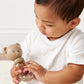 Itzy Ritzy Silicone Rattle Toy - Soothing Teething Toy with Soft Jingle Sound & Easy-Grip Textured Handle - for Ages 3 Months and Up (Bear)
