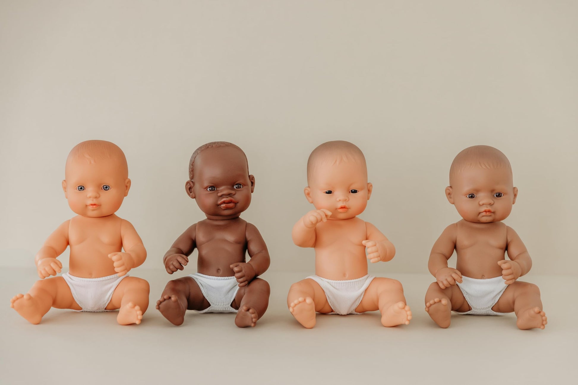 Miniland Realistic Baby Doll with Anatomically Correct Features, Reborn Baby Dolls, Cute Scented Hard Body with Vanilla Perfume, Comes in Polybag, 12