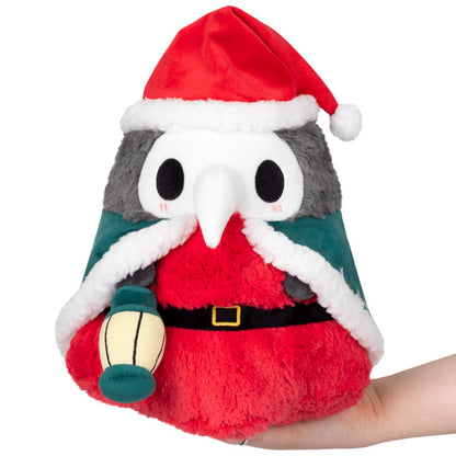 Squishable - Mini Festive Plague Doctor - The Mysterious Doctor Plague Collection - 10 in - Soft Toy Collectible Stuffed Animal - Glow in The Dark
