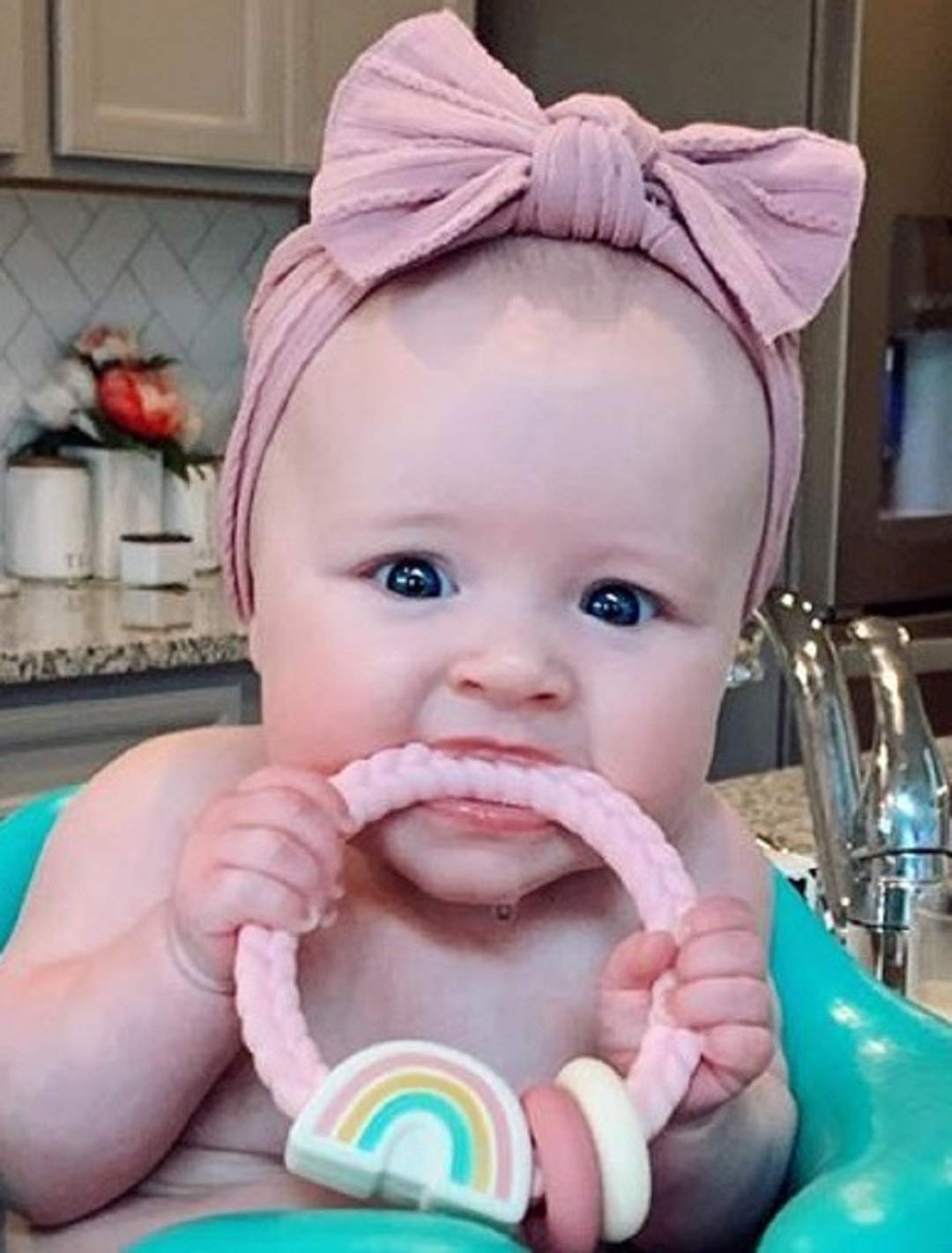 Itzy Ritzy Silicone Teether with Rattle - Rattle Teether Features Rattling Sound, Two Silicone Teething Rings and Raised Texture to Soothe Gums - Ages