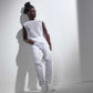 Barbie Signature Looks Ken Doll (Brunette with Braids & Bun Hairstyle) Fully Posable Fashion Doll Wearing White Shirt & Pants, Gift for Collectors