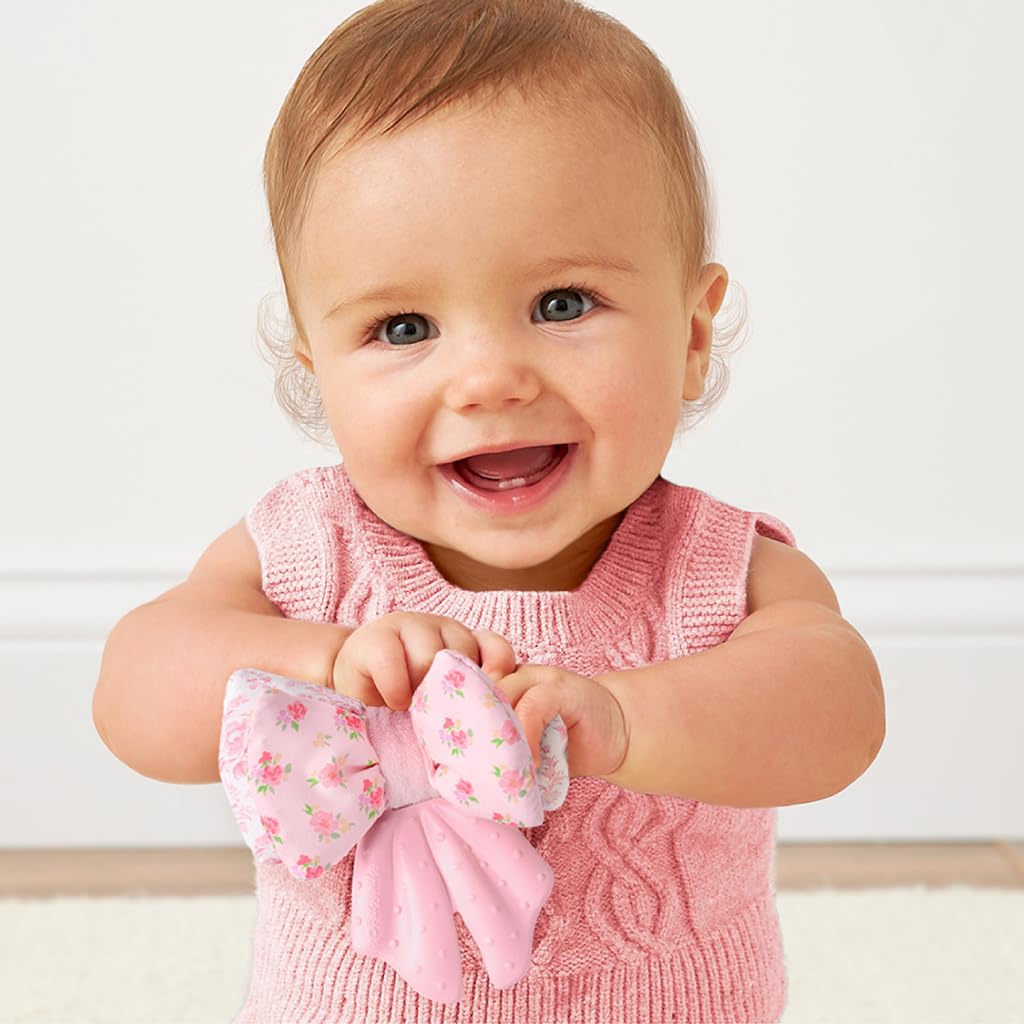 Itzy Ritzy Crinkle Teether Toy - Bow Teething Toy Includes Silicone, Velour & Crinkle Material - Features Multiple Textures for Teething Relief