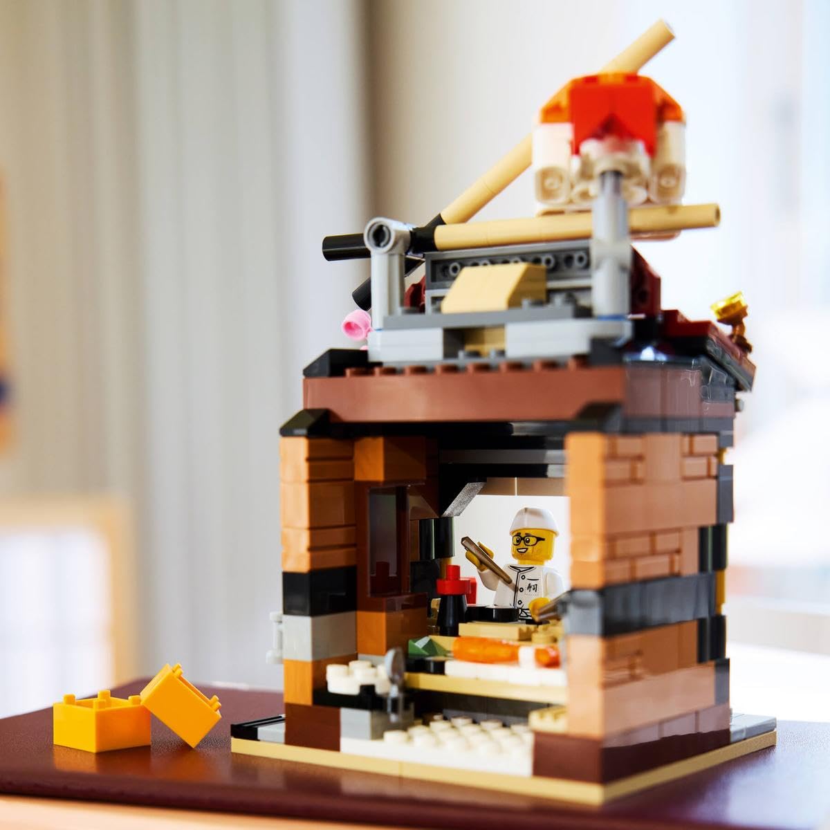 LEGO Restaurants of the World: Japan - 289-Piece Japanese Restaurant Building Kit with Chef Minifigure, Sushi Decor Display Model, Collectible Gift
