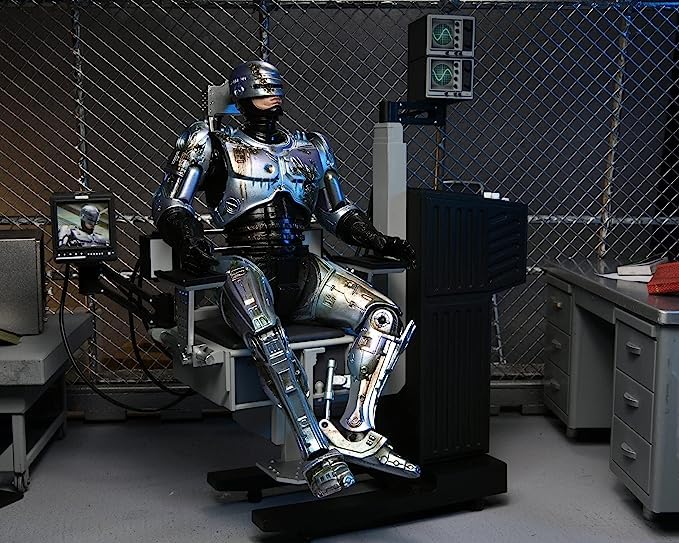 NECA - Robocop Battle Damaged Robocop w/Chair Ultimate 7" Action Figure