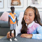 Barbie Fashionistas Ken Fashion Doll #203 with Twisted Black Hair Wearing Orange Athletic Jersey, Shorts & White Sneakers