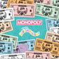 Monopoly: Squishmallows Collector’s Edition Board Game, Exclusive Cam the Cat Plush Included, Buy, Sell, & Trade Spaces Featuring Iconic Characters