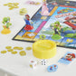 Monopoly Junior Super Mario Edition Board Game, Fun Kids' Ages 5 and Up, Explore The Mushroom Kingdom as Mario, Peach, Yoshi, or Luigi (Amazon