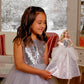 Barbie Signature 2021 Holiday Doll (12-inch, Blonde Wavy Hair) in Silver Gown, with Doll Stand and Certificate of Authenticity, Gift for 6 Year Olds