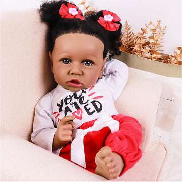 kgniess me Lifelike Black Reborn Baby Dolls 22 Inch Baby Soft Body Realistic Newborn Baby Dolls African American Real Life Baby Dolls Cloth Body Doll