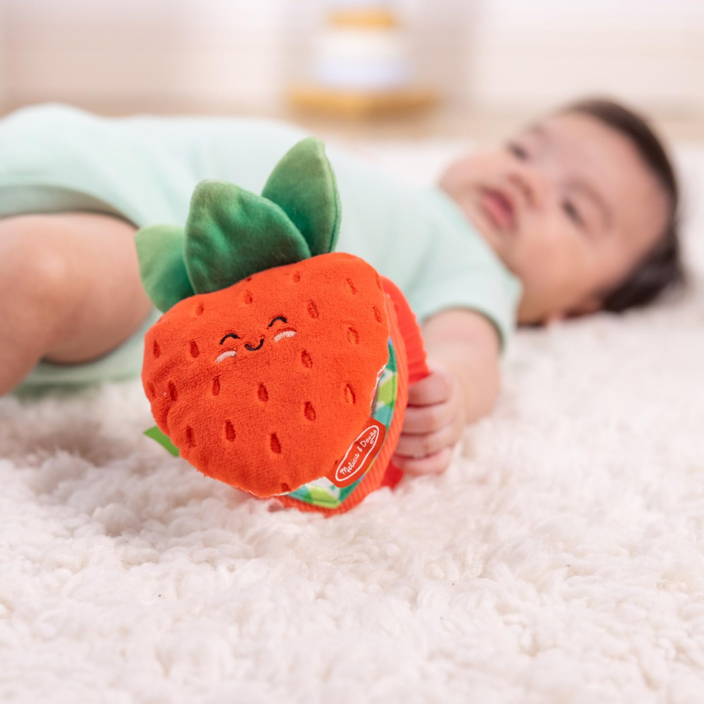 Melissa & Doug Peek-a-Boo Berry Take-Along Toy with Teether, Clip-On Stroller Toy for Baby Ages 12m+