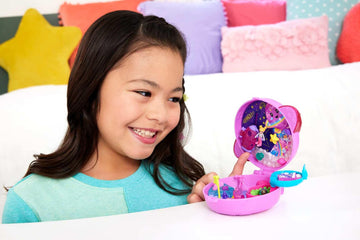 Polly Pocket Dolls and Playset, Planet Polly Outer Space Compact, Travel Toy with 1 Micro Doll, Pet Puppy & Themed Accessories