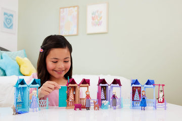 Mattel Disney Frozen Anna or Elsa Playset with 5 Surprises Including Small Doll, Tower & 3-4 Arendelle Village Accessories (Characters May Vary)