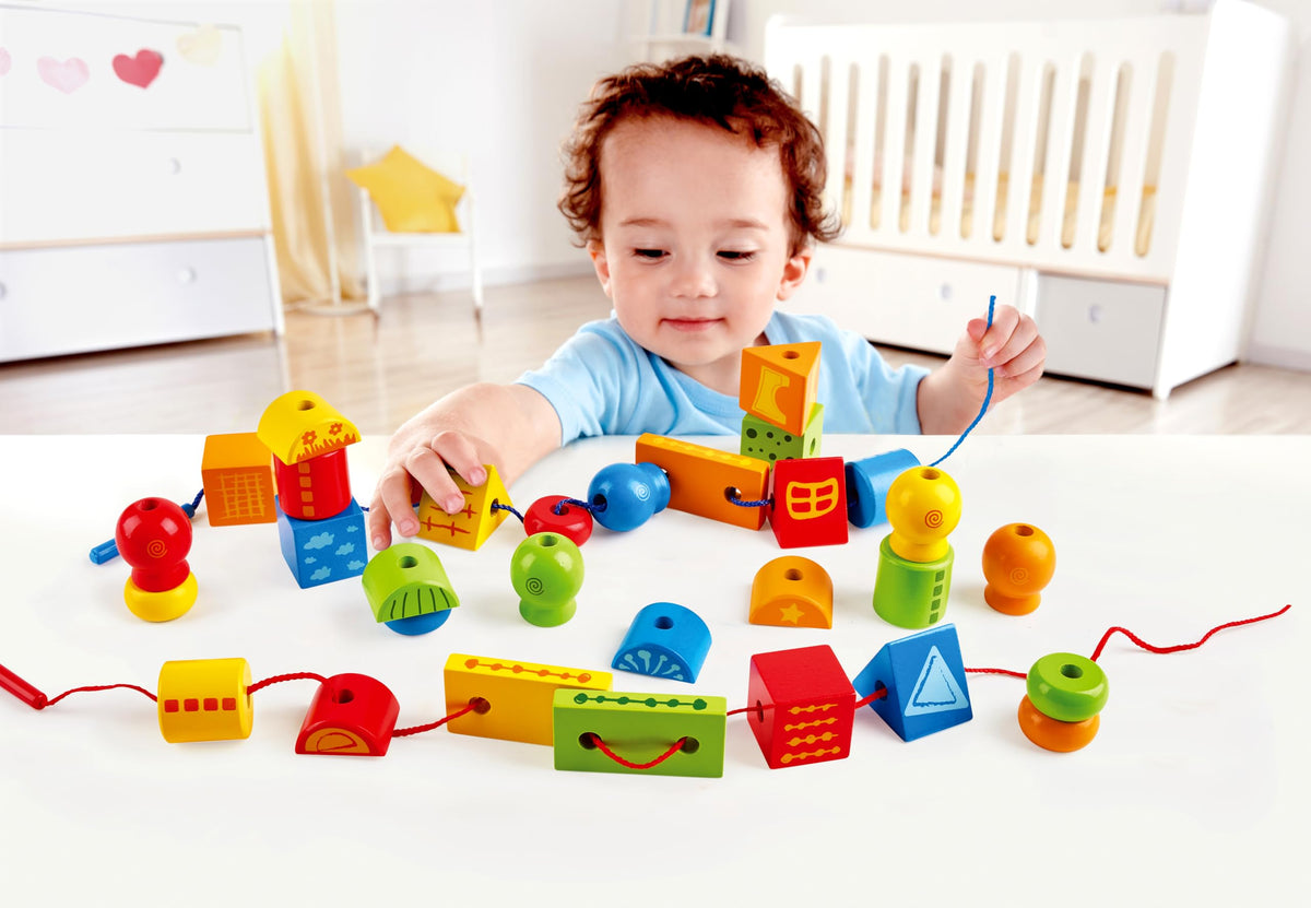 Hape String Shapes Wooden Toy Blocks in 32 Pieces, 3+ Years, Water Based Paint, String
