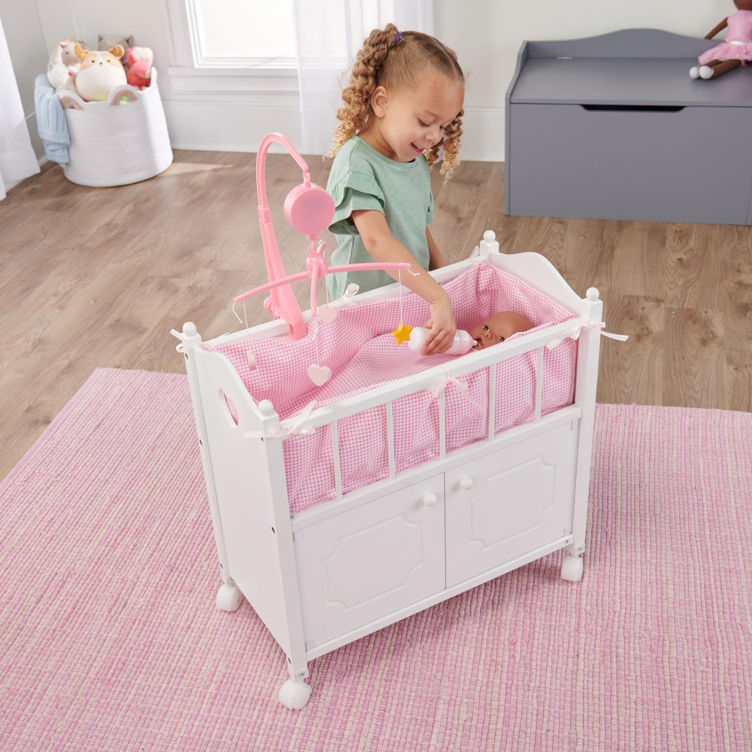 Badger Basket Wooden Toy Doll Bed with Storage, Mobile, and Bedding to Pretend and Play - Includes Wheels and Free Personalization Kit - White