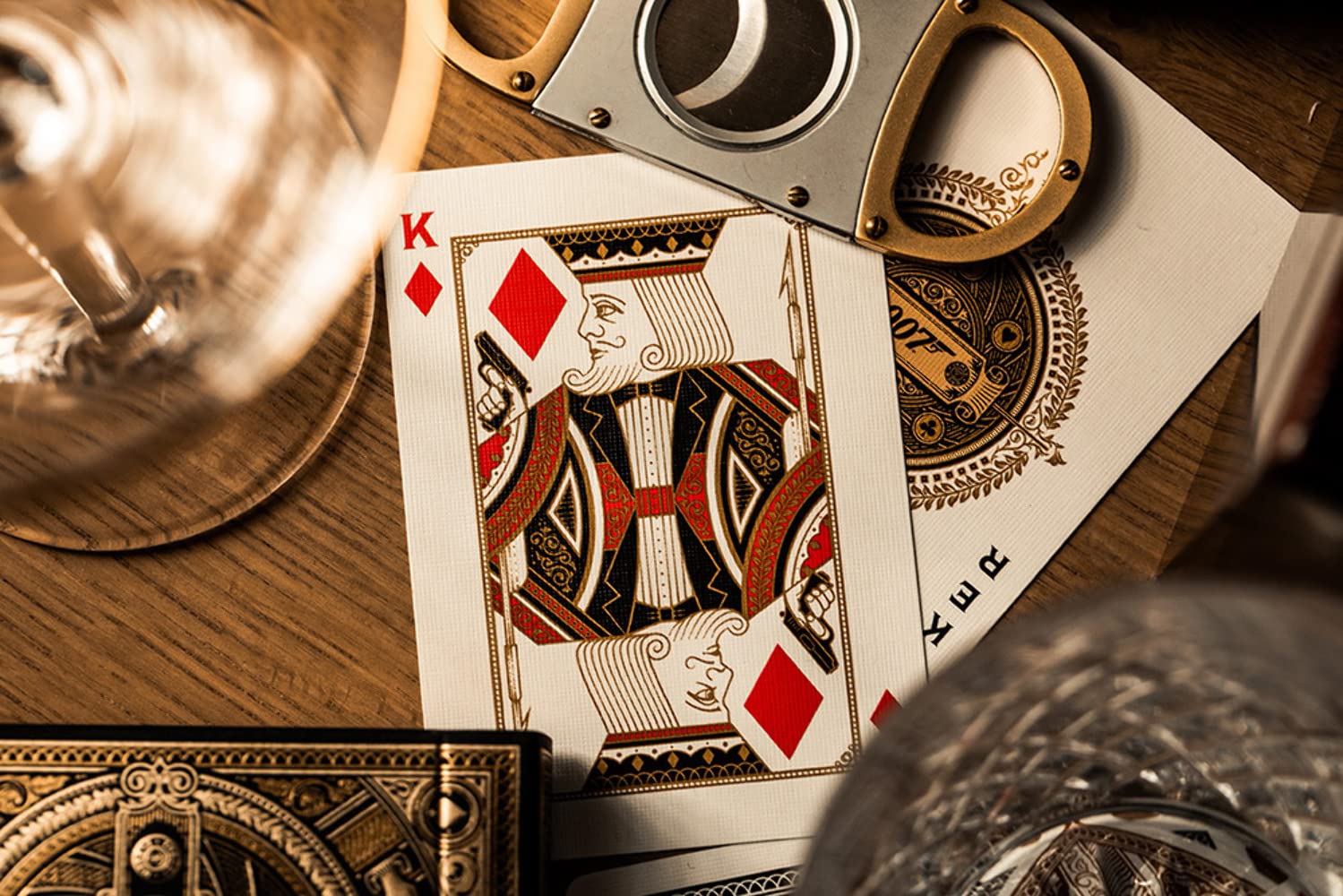 theory11 James Bond 007 Playing Cards - Gold Foil Spy Movie Poker Deck with Custom Aces, Jokers & Court Art for Magic, Cardistry, Game Night, Gifts