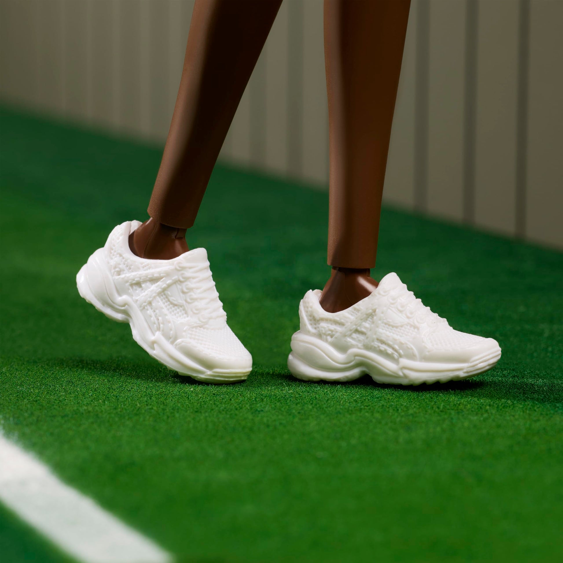 Barbie Inspiring Women Series, Venus Williams Fashion Doll with Signature Tennis Uniform and Racket, Includes Displayable Packaging