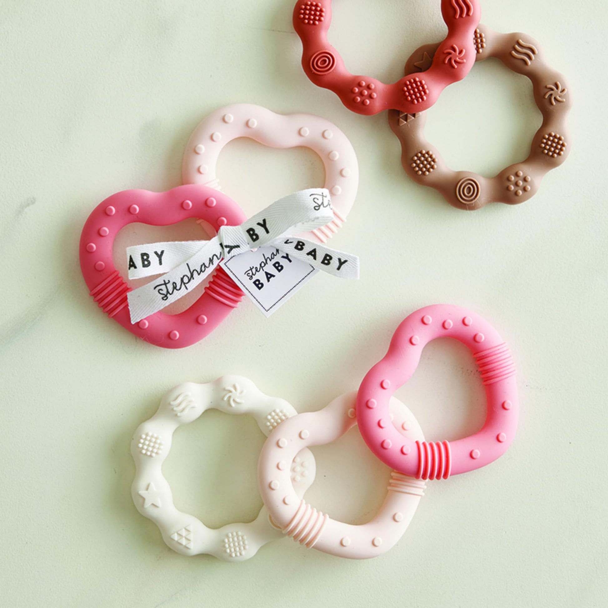 Stephan Baby Infant Teether - Heart-Shaped Silicone Baby Teething Toy with Integrated Texture, 3", Light Pink