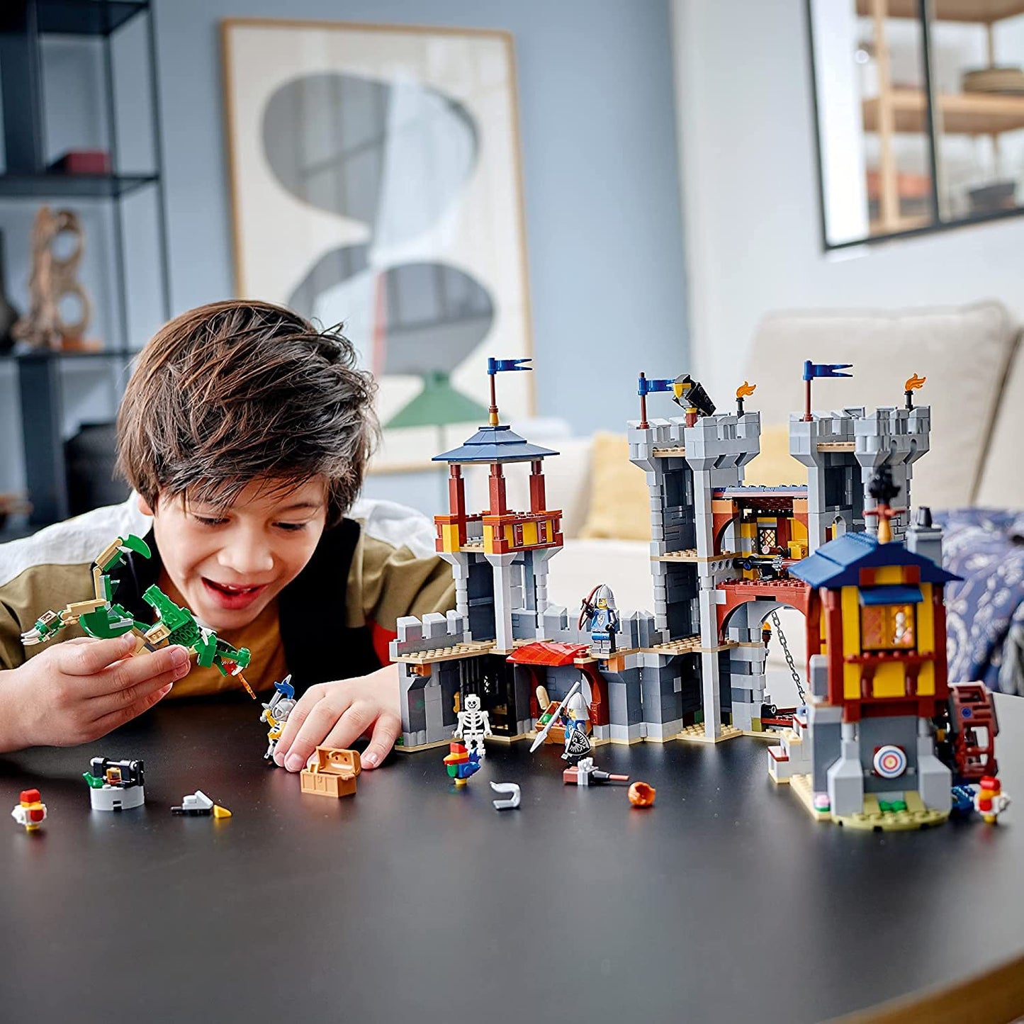 LEGO Creator 3 in 1 Medieval Castle Toy, Transforms from Castle to Tower to Marketplace, Includes Skeleton and Dragon Figure, with 3 Minifigures and