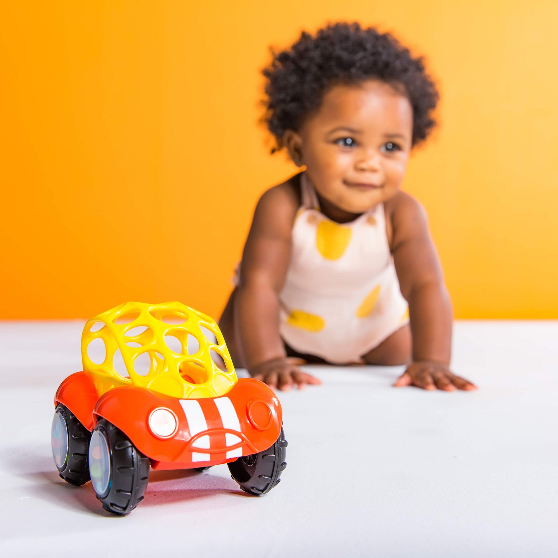 Oball Easy Grasp Rattle & Roll Buggie BPA-Free Push Car Infant Crawling Toy, 1 Pack, Age 3 Months and up, Red/Yellow