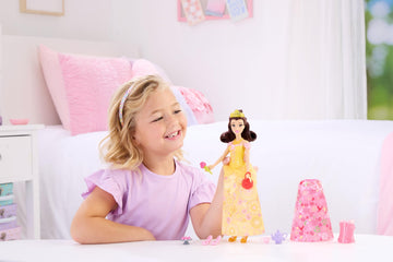 Mattel Disney Princess Toys, Belle Fashion Doll with 2 Looks, 9 Accessories, 2 Snap-On Bodices & 2 Skirts, 2-in-1 Stories Inspired by Movie